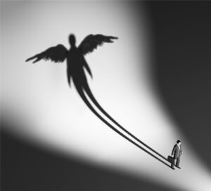 Winged shadow cast by a tiny walking figure in a bright space